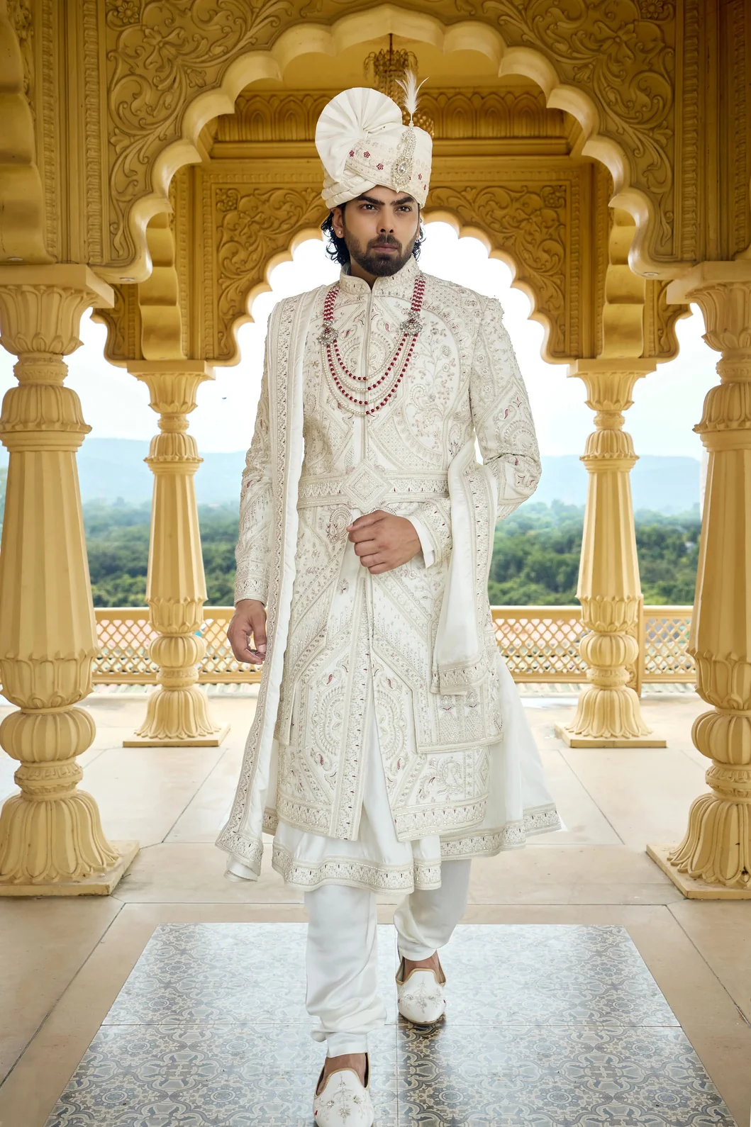 https://virasatbygopalsingh.com/uploads/team/1782984383_main_ivory-maharaja-wedding-sherwani-with-maroon-touch.webp